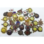 A collection of thirty-eight road cycling fobs,
