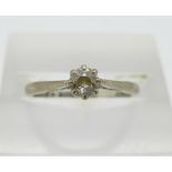 An 18ct white gold and diamond solitaire ring, 2.