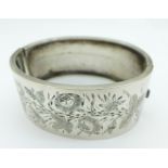 A white metal bangle