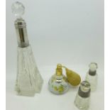 Three silver rimmed glass scent bottles,