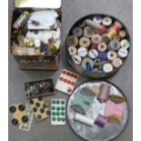 Two tins of vintage buttons and cotton reels