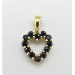 A 9ct gold and sapphire heart shaped pendant, 0.