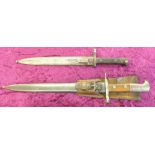 Two bayonets and scabbards, one with leather fog, Elsener Schwyz Victoria,