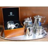 An Old Hall hammered finish four-piece tea set with tray and a Crown & Rose cast pewter tankard,