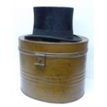 A tin hat box and top hat, R.W.