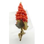 A vintage coral set brooch, tests as 9ct gold, 5.