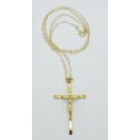 A 9ct gold crucifix and chain, 2.