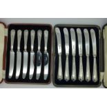 Two cased sets of silver handled knives