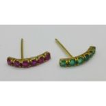 Two yellow metal earrings, one set with emeralds,