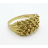 A 9ct gold ring, 5.
