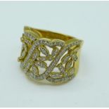An 18ct gold and multi diamond set ring, 8g,
