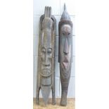 Two carved tribal wall hanging masks,