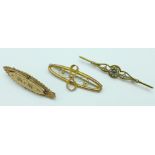 A 9ct gold bow brooch, 1.5g, a 15ct gold brooch set with seed pearls, 3.