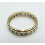 A 9ct white and yellow gold eternity ring, 2.
