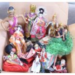 A box of oriental and costume dolls