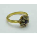 An 18ct gold, white stone and sapphire cluster ring, 3.