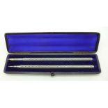 A Sampson Morden & Co white metal pen and pencil set,