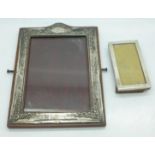 Two silver photograph frames