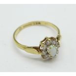 A 9ct gold, opal and white stone cluster ring, 1.