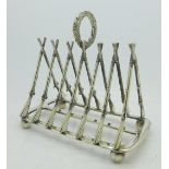 A 19th Century silver plated toast rack with crossed muskets