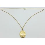 A 9ct gold locket and chain, 8.