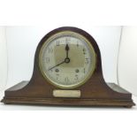 An oak mantel clock with striking movement, the movement marked Empire, Made in England,