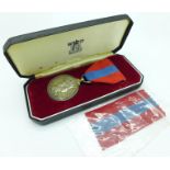 An Imperial Service Medal, cased,