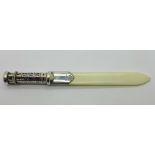 A silver mounted letter opener with novelty adjustable calendar handle by Walker & Hall,