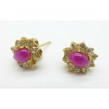 A pair of yellow metal, pink cabochon and white stone earrings, 2.