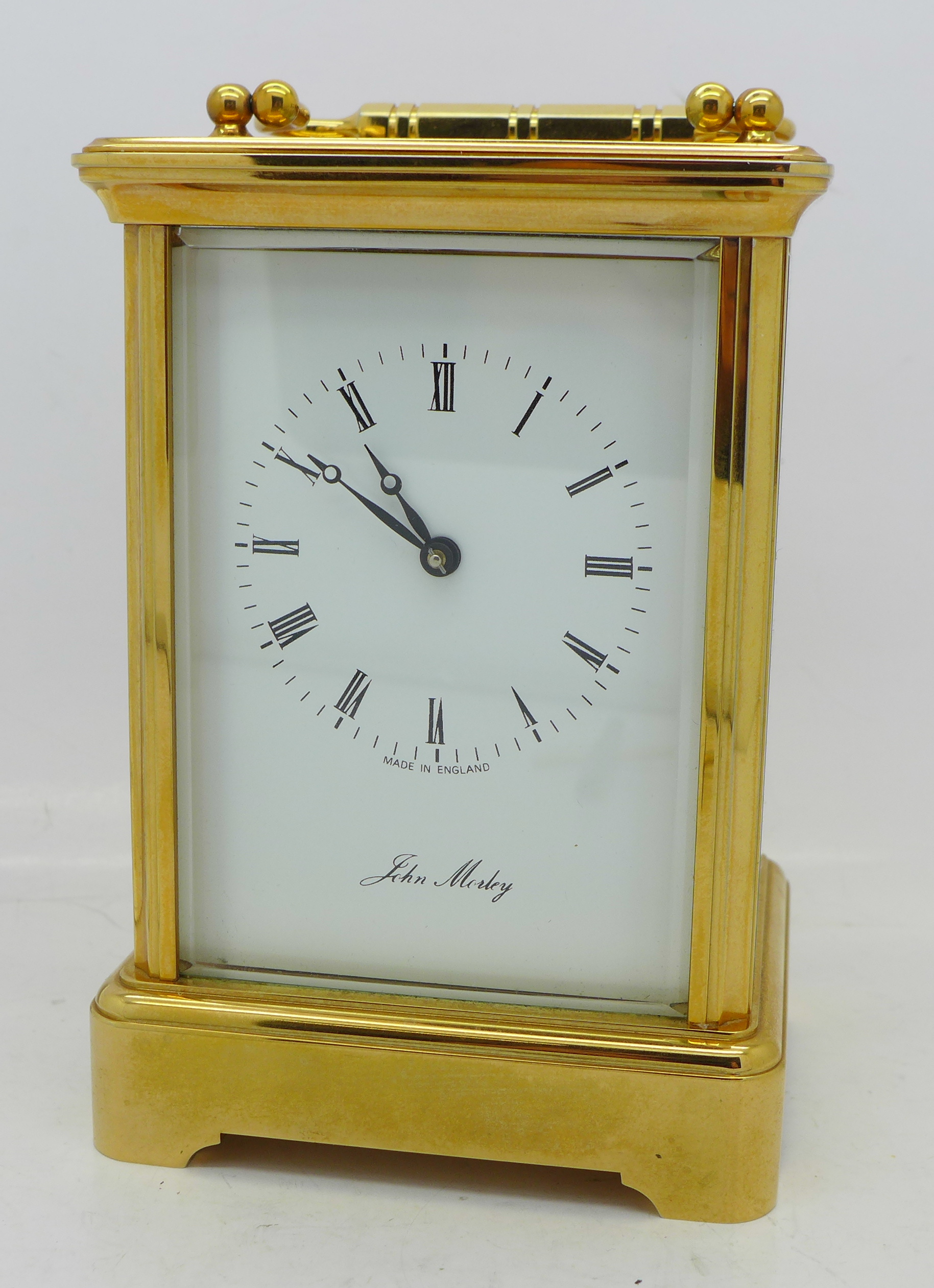 A carriage clock, with strike movement, John Morley, made in England, with box, height 13.