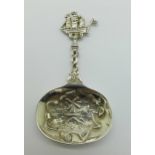 A silver caddy spoon with import mark,