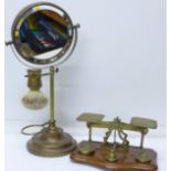 A shaving mirror and a set of postal scales