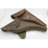 Two officers leather pistol holders