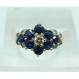 An 18ct gold, sapphire and diamond cluster ring, 4g,