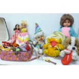 A collection of dolls,