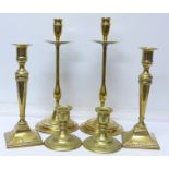 Three pairs of brass candlesticks