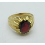 A 9ct gold and red stone ring, 3.