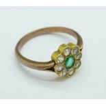 A 9ct yellow metal, emerald and white sapphire cluster ring, 2.