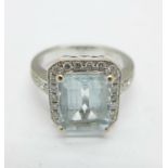 An 18ct white gold, aquamarine and diamond ring, 8.