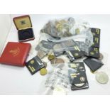 A collection of coins including 1977 and 1981 crowns, a Royal Mint Queen's 90th Birthday, etc.