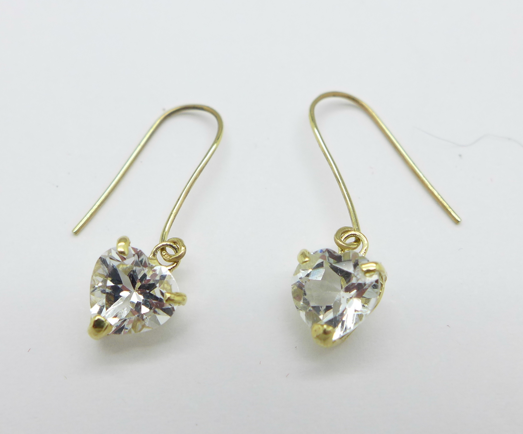 A pair of 9ct gold and white topaz earrings, 0.