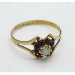 A 9ct gold, opal and garnet ring, 1.