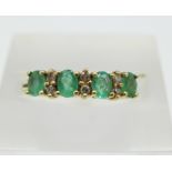 A 9ct gold, diamond and emerald ring, 2.