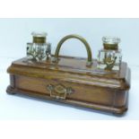 An oak standish with drawer, one inkwell a/f,