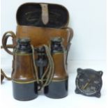 A pair of French field glasses in a leather case, Jumelles Beraisme retailer and a U.S. Gauge Co.