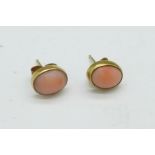 A pair of 9ct gold coral set earrings