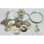 A collection of jewellery including silver