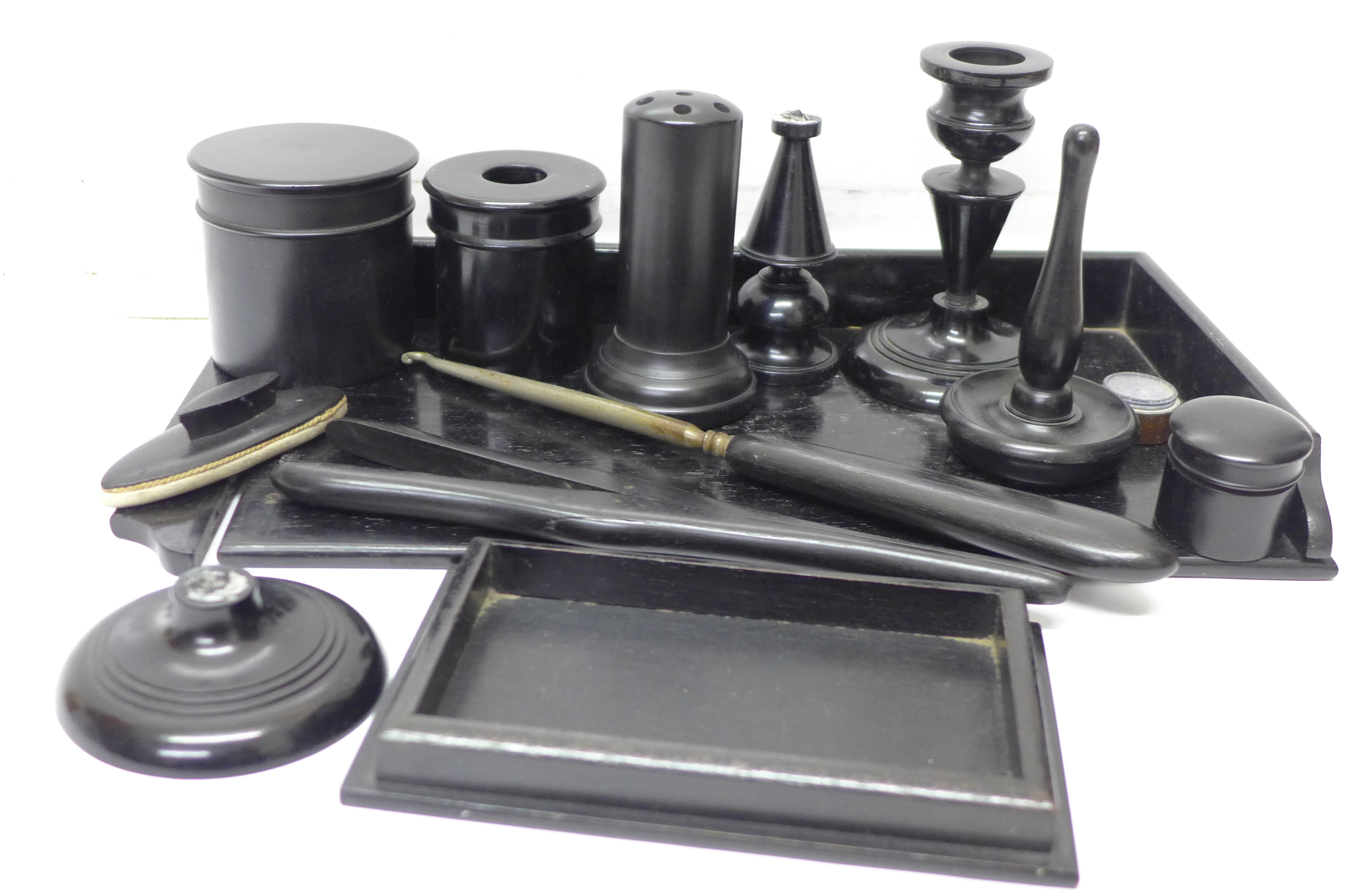 An ebonised dressing table set,