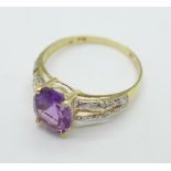 A 9ct gold, amethyst and diamond chip ring, 1.