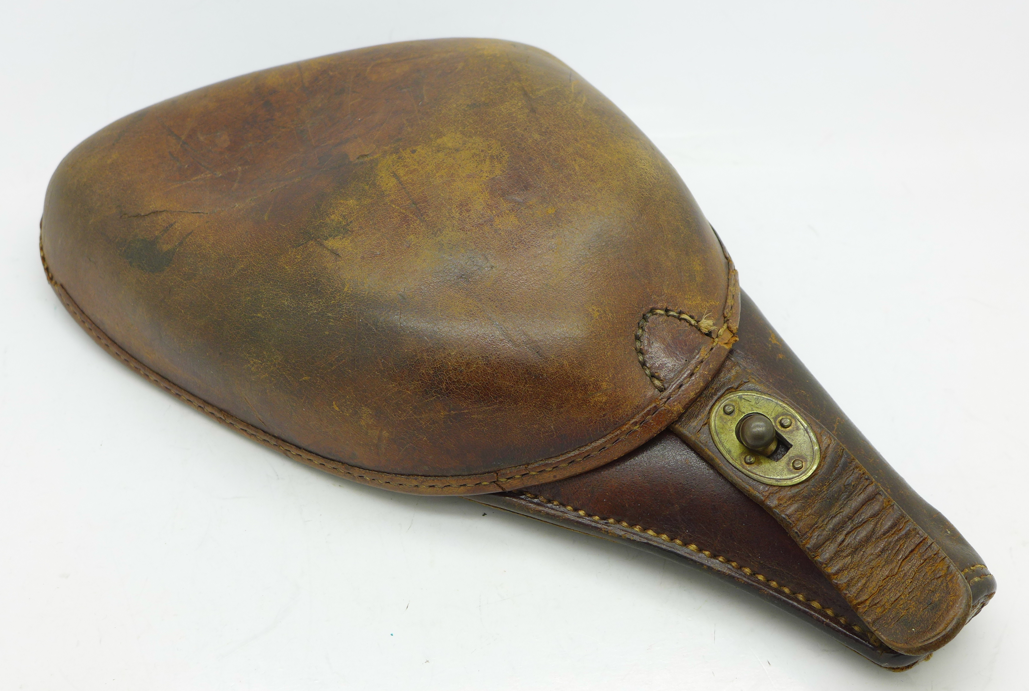 A WWI period officer's brown leather pistol holder with bullet pouch